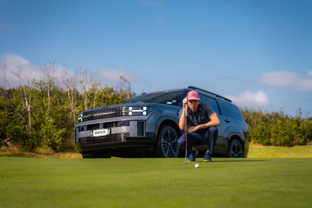 There was a hush over the crowd as he lined up a putt for the Championship.