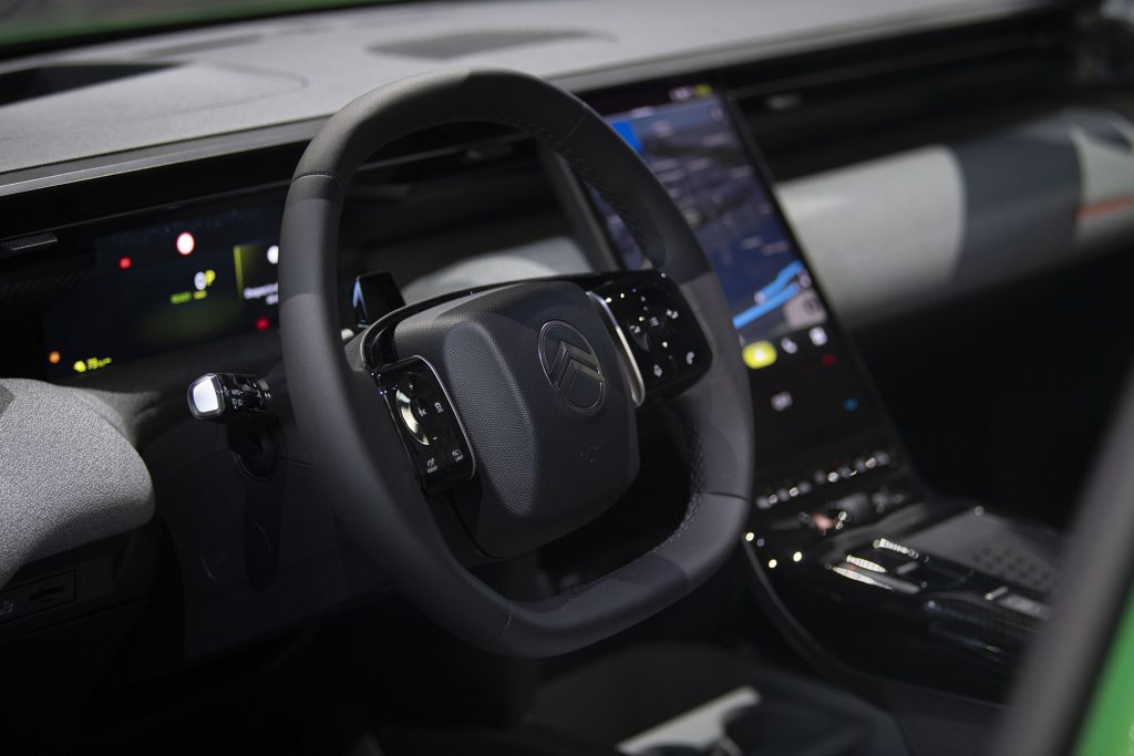 Hexagonal shape to the two-spoke steering wheel.