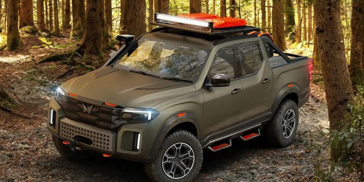 Mahindra Pik Up in green in a forest