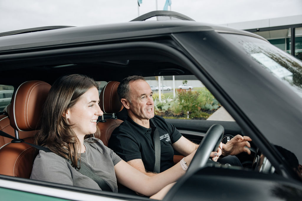 Greg Murphy advises budding driver.