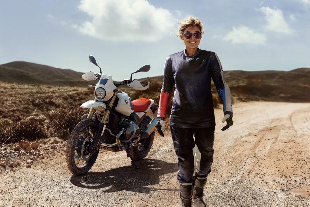 Hmm, no helmet and no helmet hair. This photo reeks of fake to me.