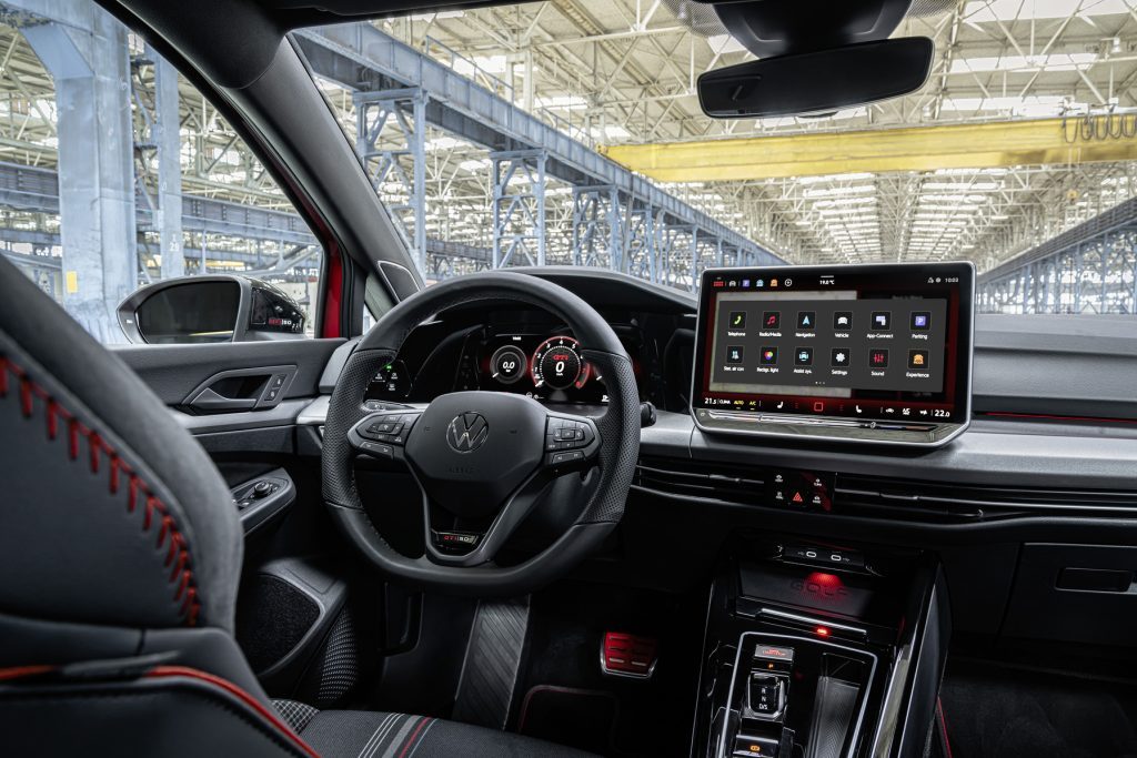 Serious inside too with sports pedals, returned steering, and new tartan for the seat coverings.
