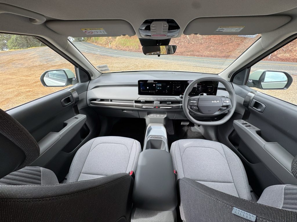 What it looks like inside, minimalist, and with textile seat coverings.