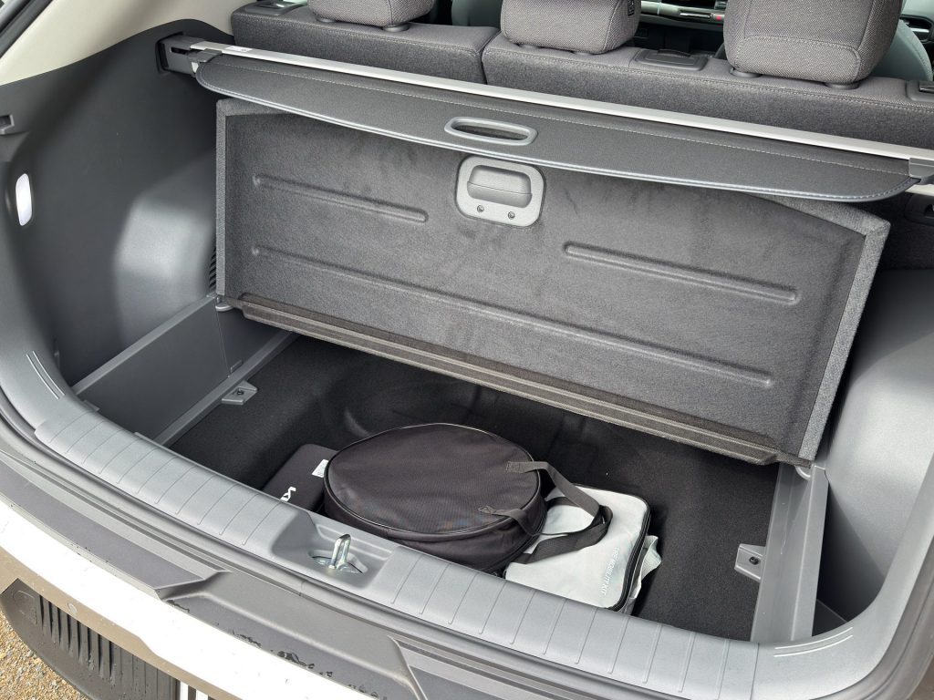 Beneath the floor, another trunk of sorts.
