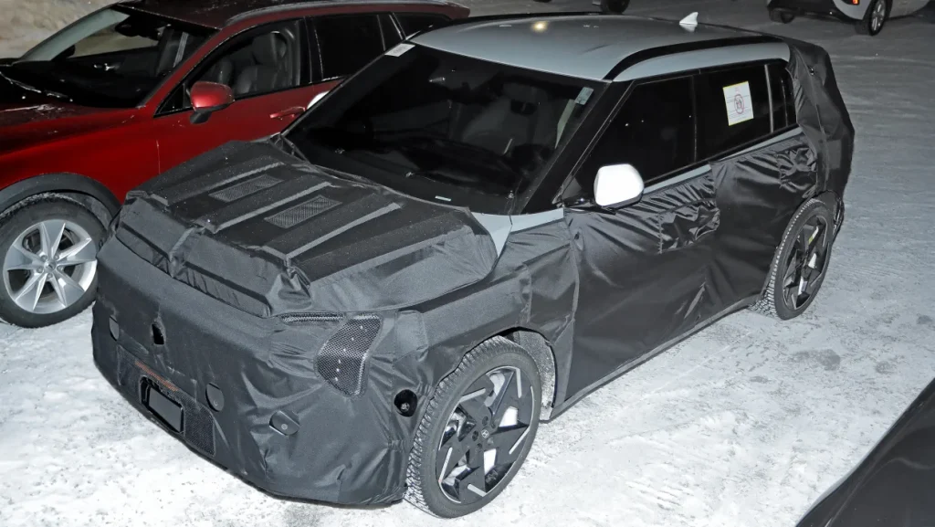 Heavy camouflage for this tester thought to be the Kia EV3 GT.