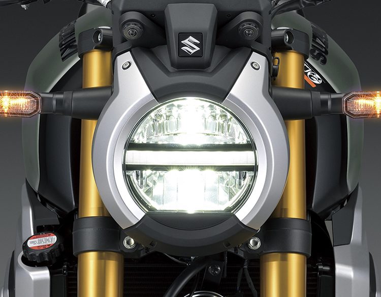 Retro round headlight with LED centre strip.