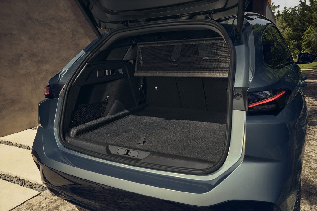 Estate offers a bit more space in the back than hatch, only a bit mind.