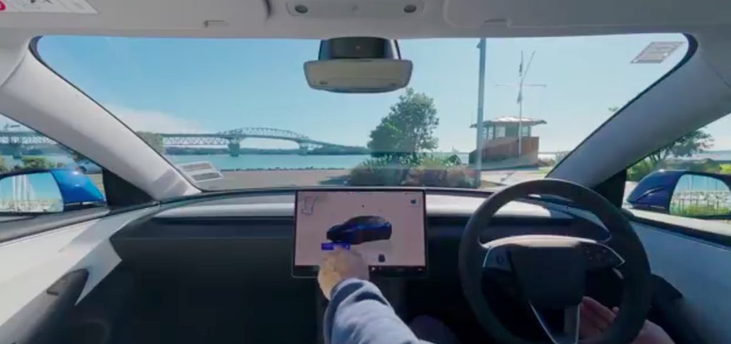 View of Auckland harbour bridge from a Tesla