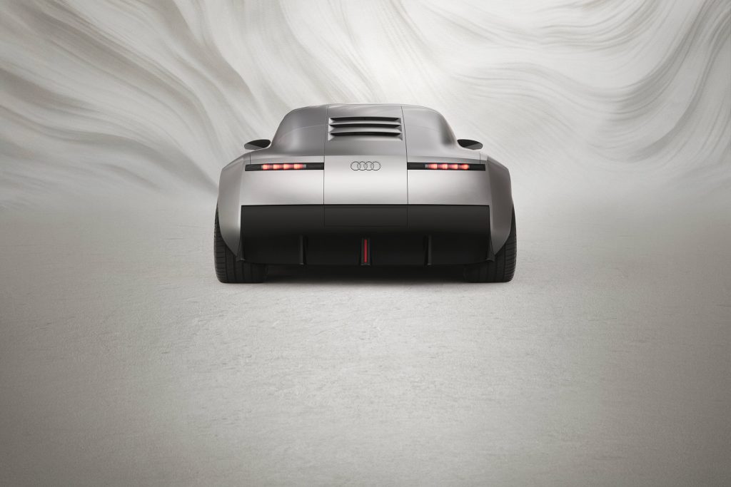 Rear remind slightly of upcoming Jaguar GT, without a screen of any sort.