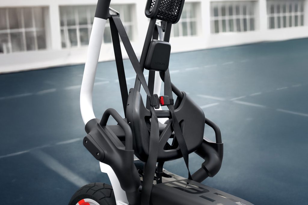 Safety belt and cage change everything, meaning no helmet required.