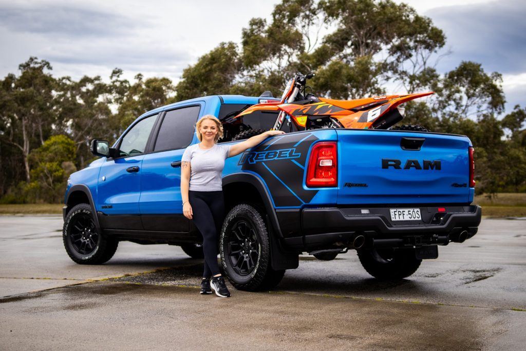 Blue Ram Rebel with a bike on the back
