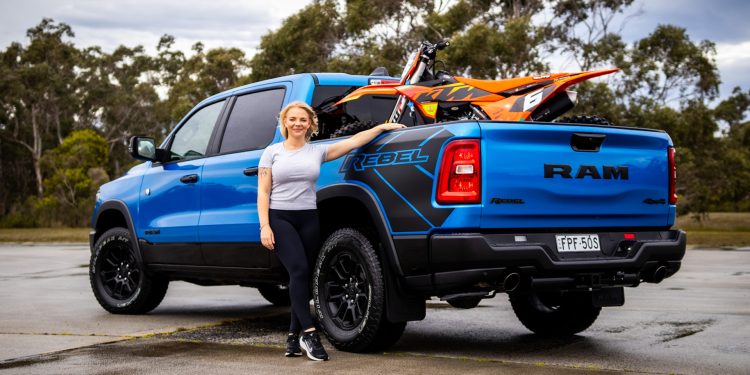 Blue Ram Rebel with a bike on the back