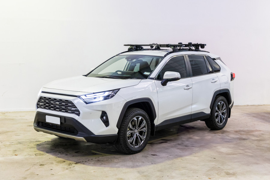 SUVs like this parked up on the side of a highway may have a speed camera operating. 