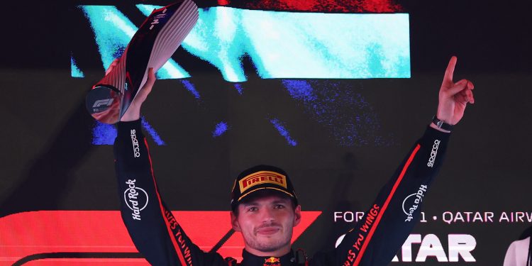 LUSAIL CITY, QATAR - NOVEMBER 30: Race winner Max Verstappen of the Netherlands and Oracle Red Bull Racing lifts his trophy on the podium during the F1 Grand Prix of Qatar at Lusail International Circuit on November 30, 2025 in Lusail City, Qatar. (Photo by Dom Gibbons/LAT Images) // Getty Images / Red Bull Content Pool // SI202511300701 // Usage for editorial use only //